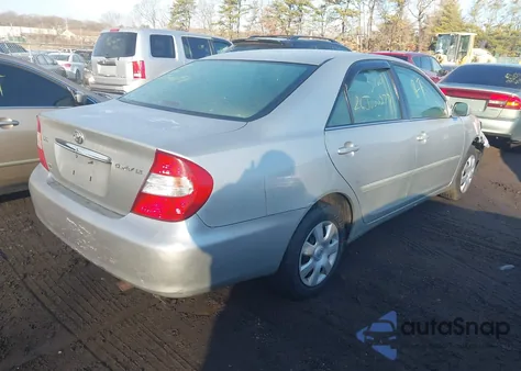 2003 Toyota Camry Le z USA, uszkodzony, nr VIN 4T1BE32K33U183543